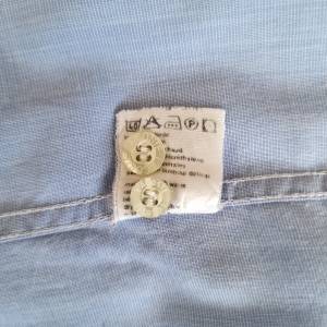 LACOSTE plava košulja dugi rukav (L)