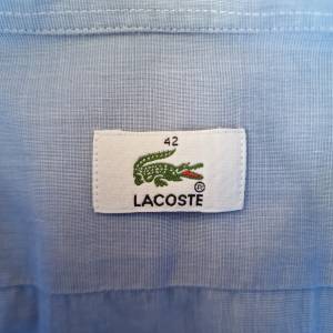 LACOSTE plava košulja dugi rukav (L)