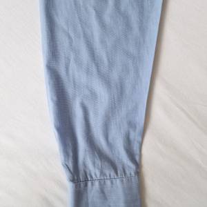 LACOSTE plava košulja dugi rukav (L)