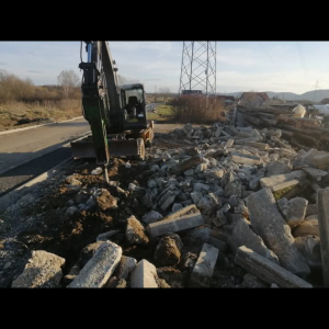 VOLVO BAGER SA MONTABERT PIKAMEROM,ZAMJENA