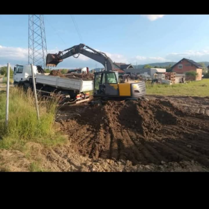 VOLVO BAGER SA MONTABERT PIKAMEROM,ZAMJENA