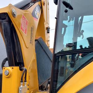 Kombinirka Caterpillar 434F2