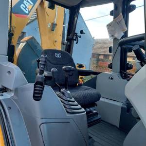 Kombinirka Caterpillar 434F2