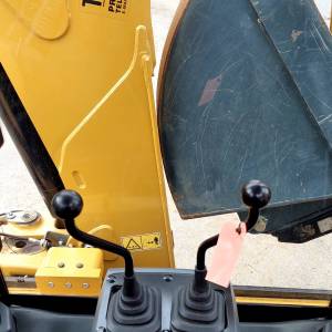 Kombinirka Caterpillar 434F2