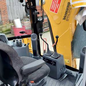 Kombinirka Caterpillar 434F2