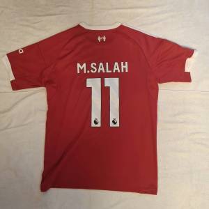 Mo Salah Liverpool 25/26 L domaci dres