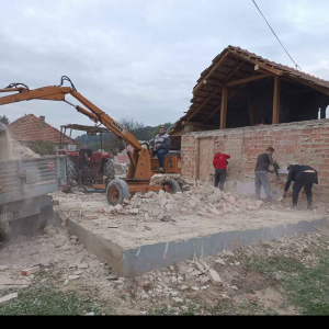 Traktorski utovarivač bager