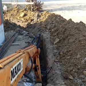 Traktorski utovarivač bager